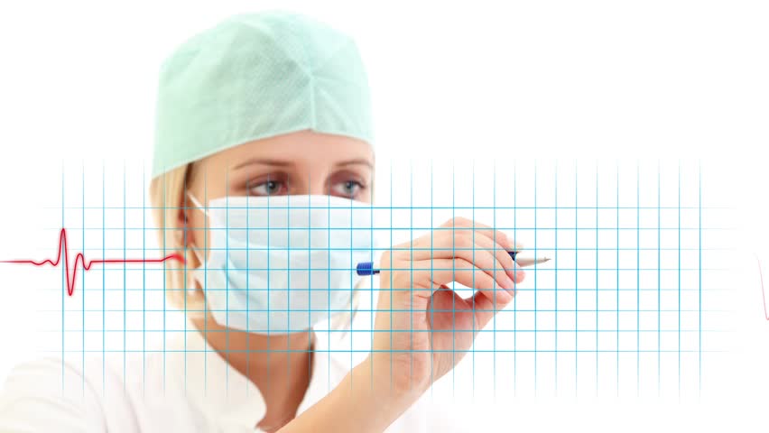 Female doctor in medical mask writing a cardiogram