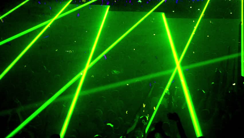 Many people at rave party, green light lazer beam lattice, view from above