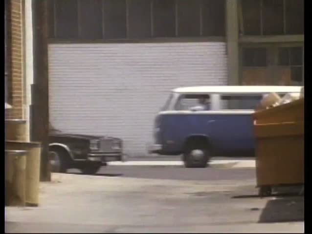 Car chase through back alley