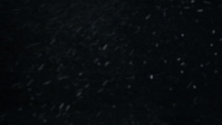 Snow plate. Composite layer with blending mode to remove black background or use as a matte. Shot at 24 full HD frames with shutter at 1/50 to match film.