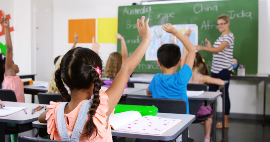 Cute Children Raising Their Fingers In The Classroom Stock Footage 