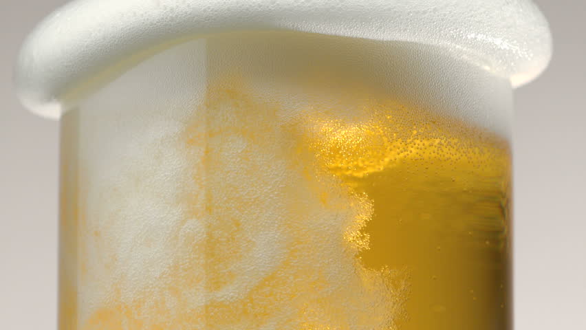 Extreme close-up beer foam and bubbles