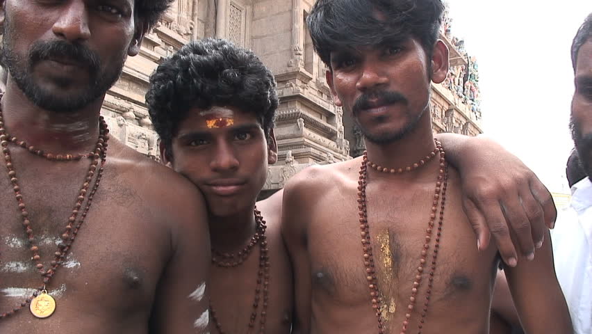 MADURAI, INDIA - NOVEMBER 30, 2006: Locals Look At the camera in Madurai, India