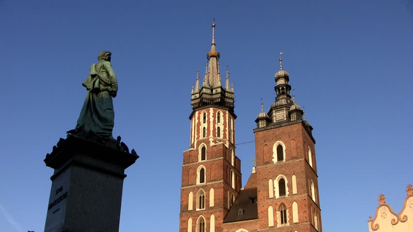 Mickiewicz Monument and Saint Mary's Basilica at Main Square, Krakow, Poland