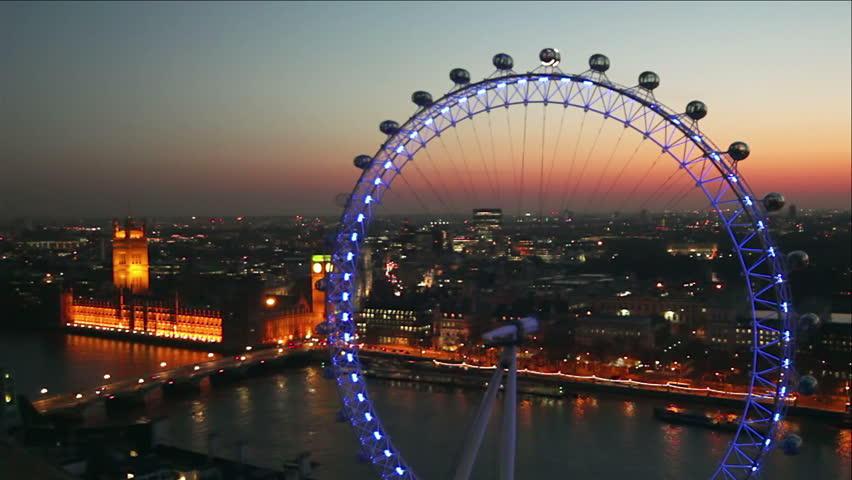 LONDON - MARCH 23: View form Shell Tower of London Eye observation wheel, Houses of Parliament and River Thames on March 23, 2011 in London. 