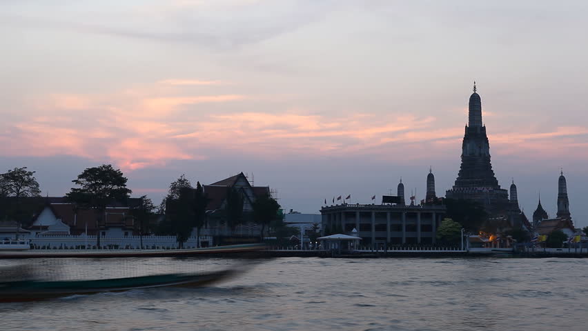 Time Lapse of Wat Arun, Buddhist Temple of the Dawn in Bangkok, Thailand, Chao Phraya River