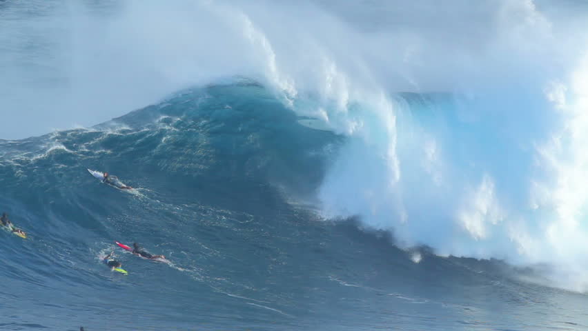 MAUI, HI - January 31: Professional surfer Jeff Rowley wipes out on a giant wave at the legendary big wave surf break known as "Jaws" during a large winter swell January 31, 2012 in Maui, HI.