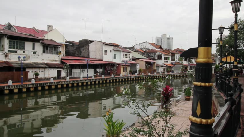 Buildings along Melaka River in Malacca Malaysia 1080p Panning