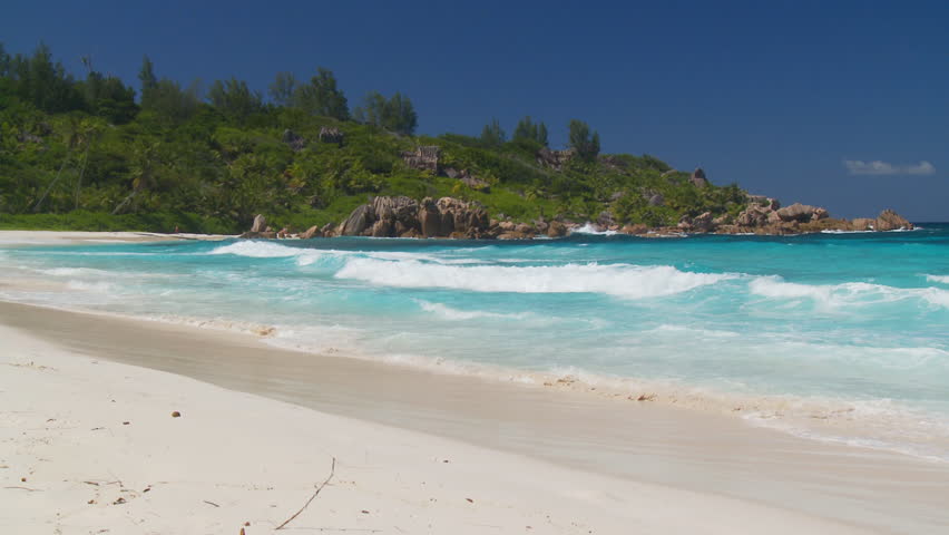 island, sandy beach and waves waiting for you