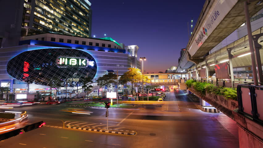 BANGKOK - FEBRUARY 7: (Time lapse view) Traffic in front of MBK Center on February 7, 2012 in Bangkok, Thailand.