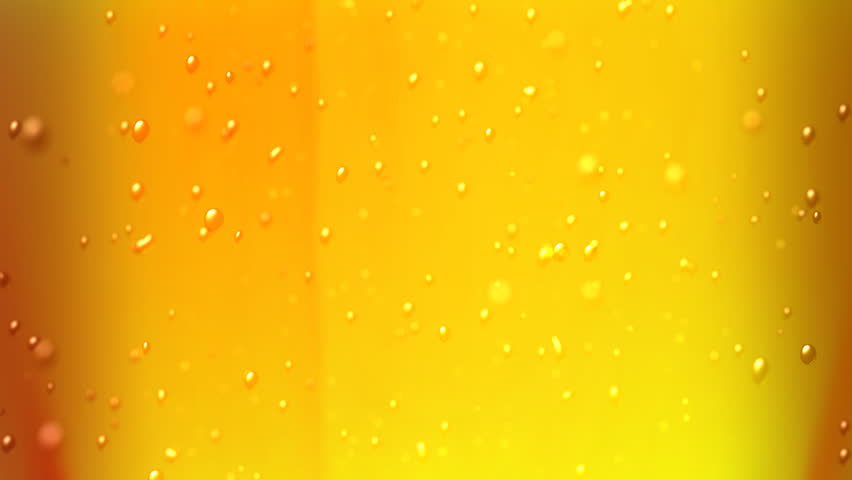 the bubbles floating up in the liquid of beer.