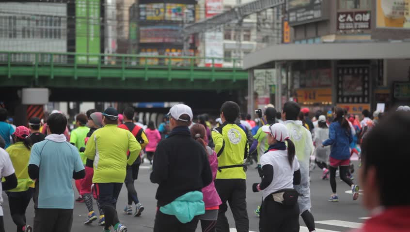 TOKYO - FEBRUARY 26: Unidentified athletes in the Tokyo Marathon on February 26, 2012 in Tokyo, Japan. With more than 36,000 participants the annual marathon is the country's biggest event.