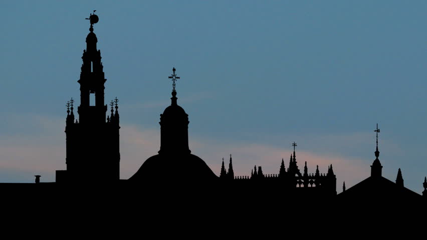 The Seville Cathedral, or Catedral de Santa MariÂ­a de la Sede and Giralda Tower, former minaret converted to a bell tower for the Cathedral of Seville in Seville are located in Seville, Spain. 

