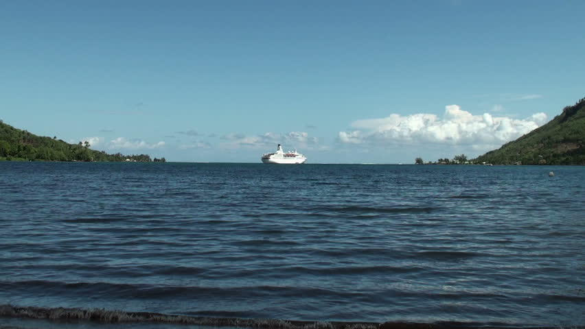 MOOREA ISLAND, FRENCH POLYNESIA - CIRCA JANUARY 2011: Astor cruise ship off Opunohu Bay, circa January 2011. This ship, registered at Nassau port, is under charter to the Germany-based Transocean Tours.