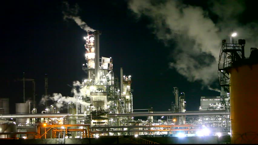 Petrochemical plant at night - smokestack