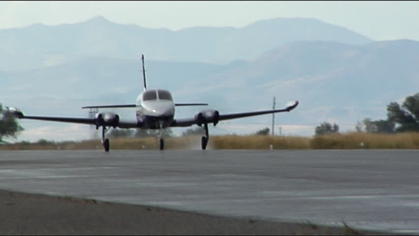 Twin Engine Plane Taking Off