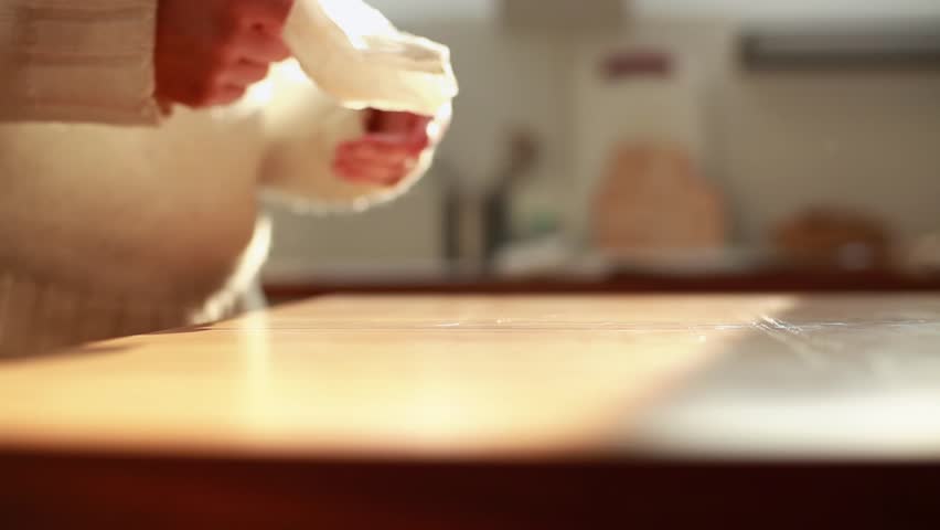 Woman Cleaning Table With Serviette. Selective Focus With Shallow Depth of Field.