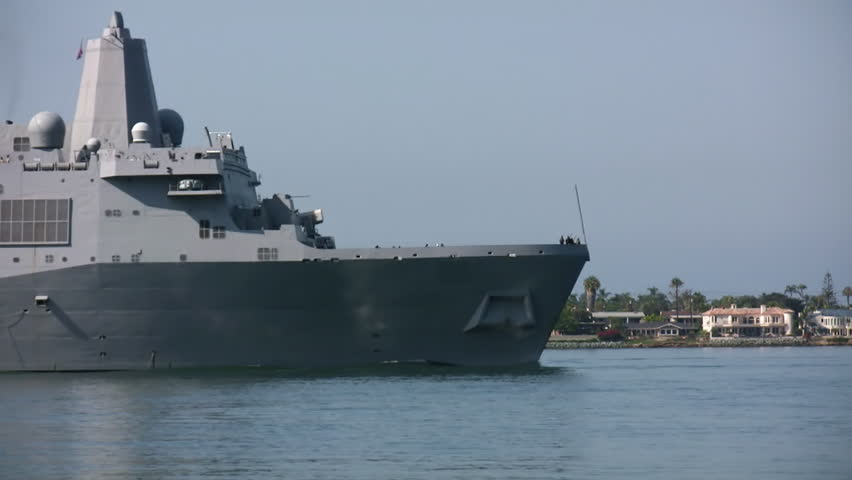 Navy Communications Ship Passing By (HD). Navy communications ship entering port for docking. All ID marks, numbers and legends have been cloned out.