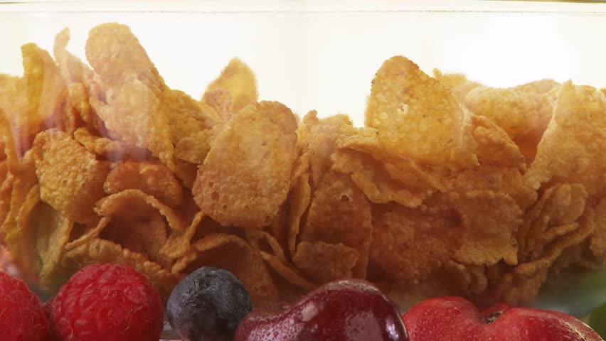 Pouring milk over cornflakes