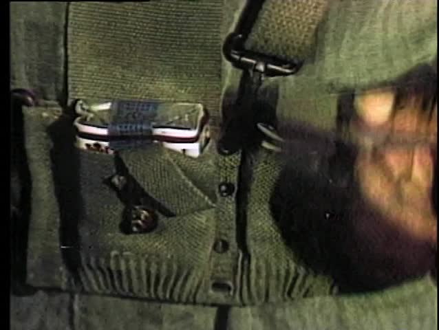 Close-up of cigarettes in ammunition belt