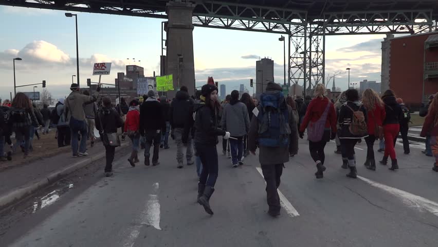 MONTREAL, CANADA - CIRCA FEBRUARY 2012 - Several thousand students are marching through the streets of Montreal in the protest against proposed tuition hikes in Quebec circa February 2012 in Montreal, Canada.