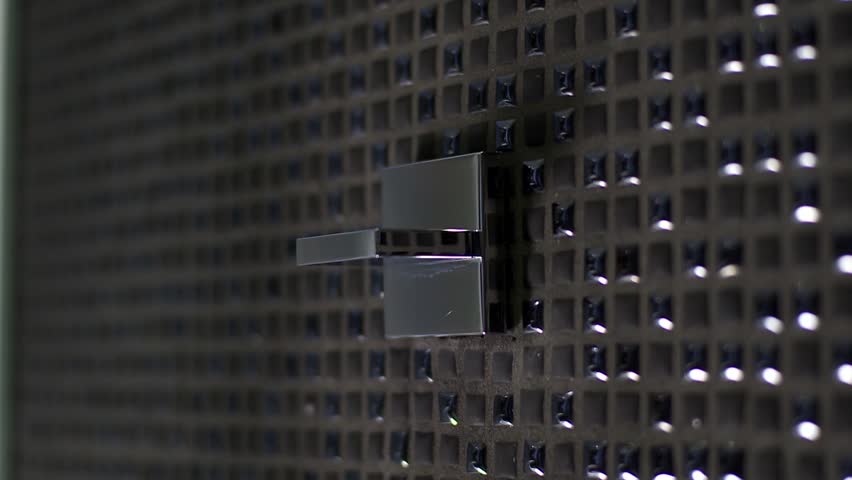 video footage of turning on a shower