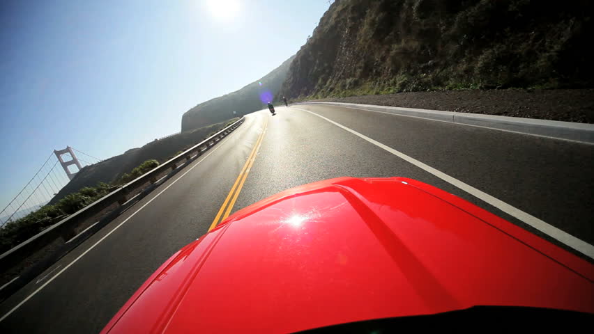 Californian road trip driving on a hillside winding road