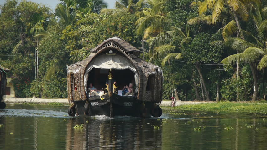 INDIA, KERALA - FEB 12: Fishermen in houseboat on the coast of the Kerala backwaters on February 12, 2012 in Kerala, India. 