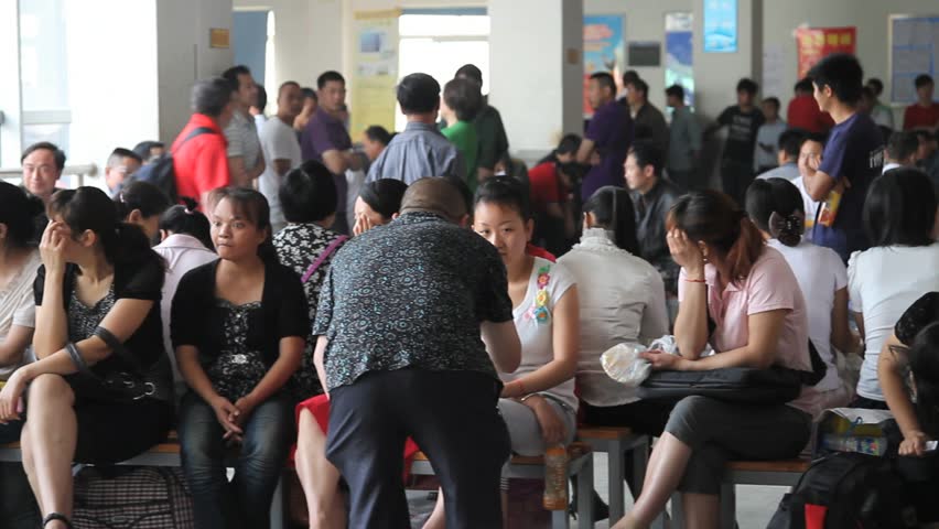 CHENGDU, CHINA - CIRCA JUNE 2011: Crowd of unemployed people at a job fair circa May 2011. Shenzhen is now reputedly considered as one of the fastest-growing cities in the world.