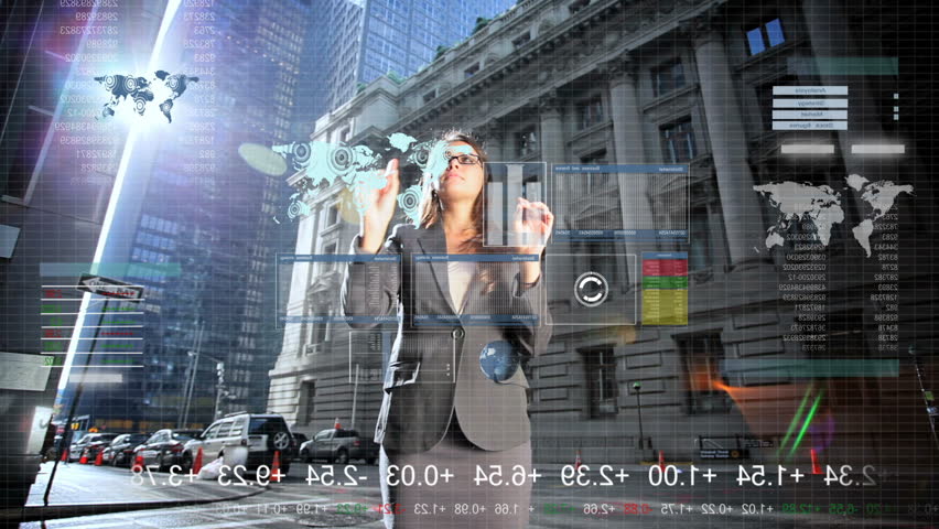 Touchscreen graphic technology being used by young female caucasian businesswoman