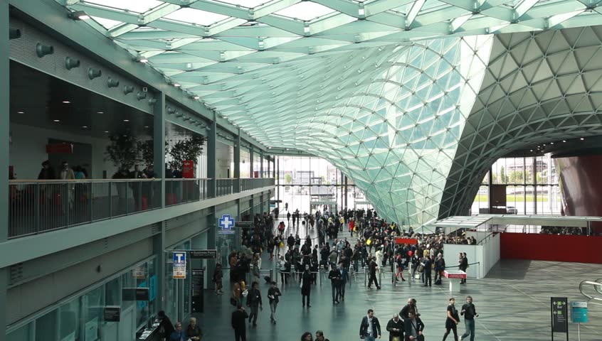MILAN - APRIL 17: People at the entrance of Salone del Mobile, international furnishing accessories exhibition on April 17, 2012 in Milan, Italy. 