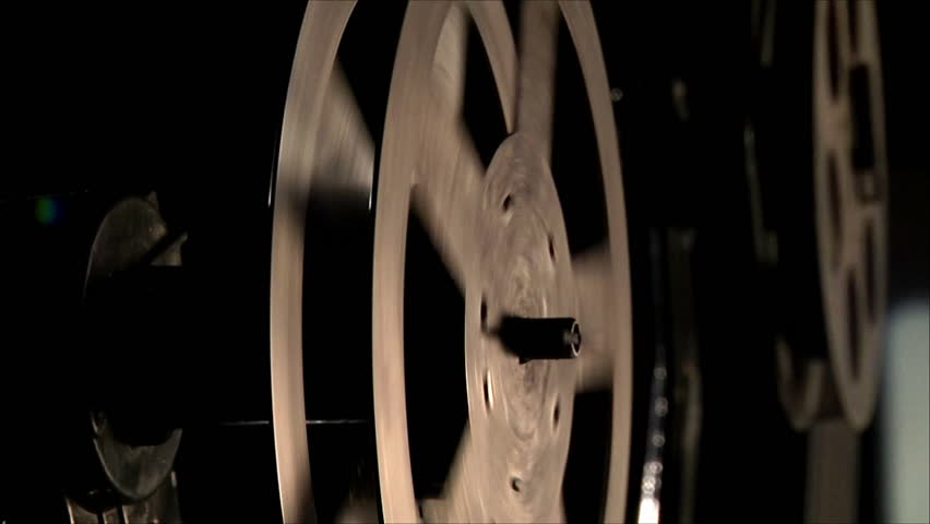 film in a projector,
with sound 