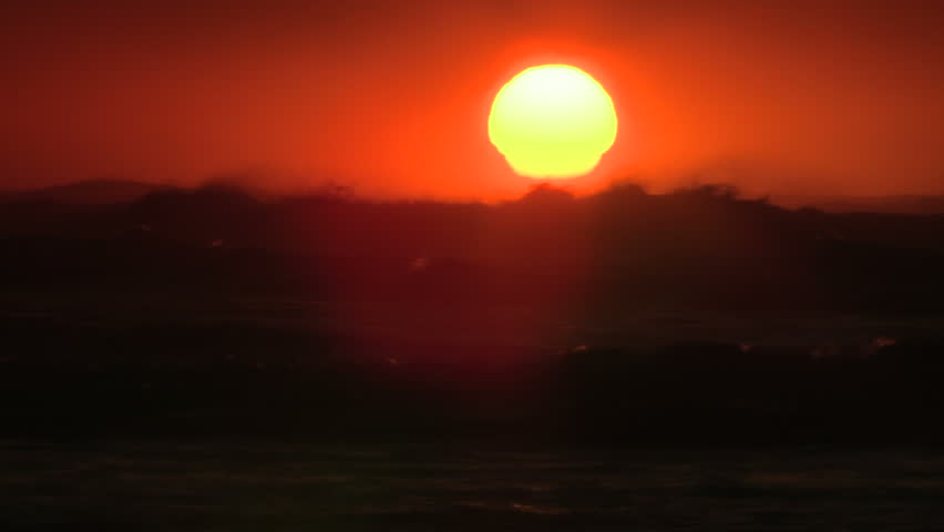 Sunrise over turbulent sea