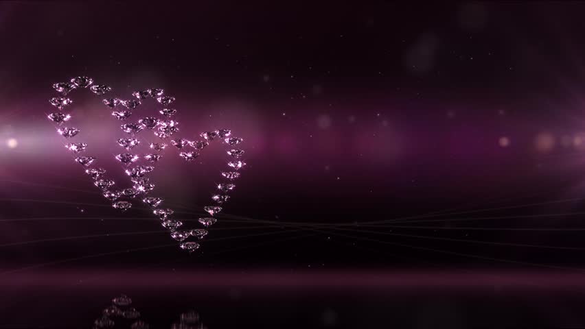 Two glamorous diamond-hearts with magic sparks.