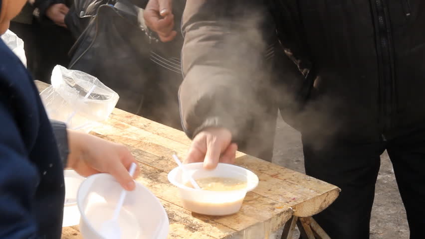 MARCH 1 - UFA, RUSSIA: 
Distribution of hot meals to homeless persons on March 1, 2012 in UFA, Russia. 