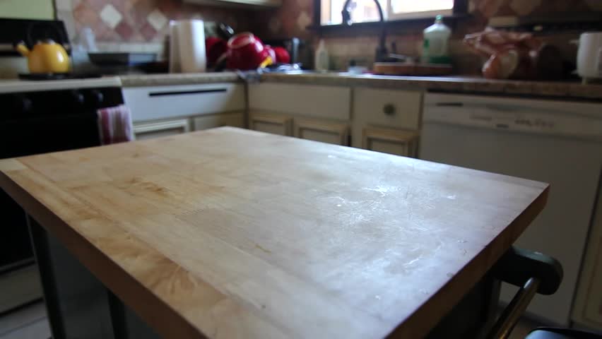 Man Cleans Kitchen