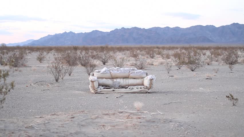 torn up couch in the middle of a desert. Wides, close ups, and pans. April 13, 2012 in the Sonoran Desert, Arizona.