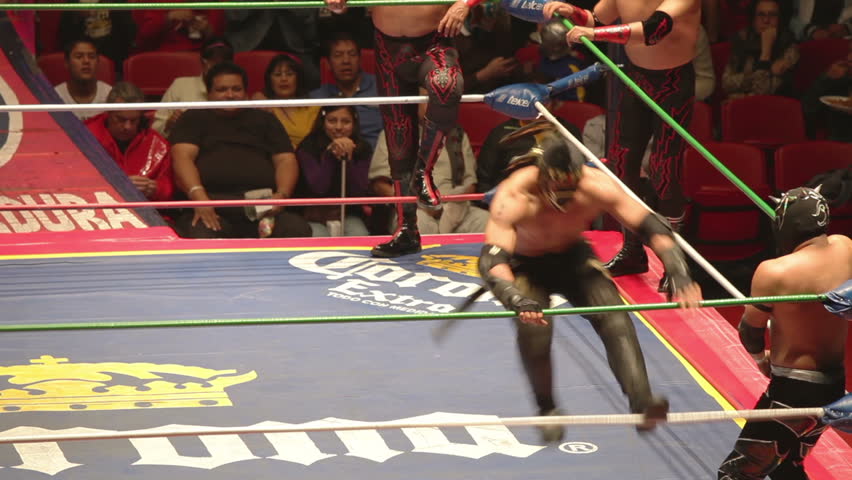 MEXICO CITY - DECEMBER 19: Ringside view of a lucha libre, famous mexican wrestling competition at Arena Mexico on DECEMBER 19, 2011 in Mexico City, Mexico. 