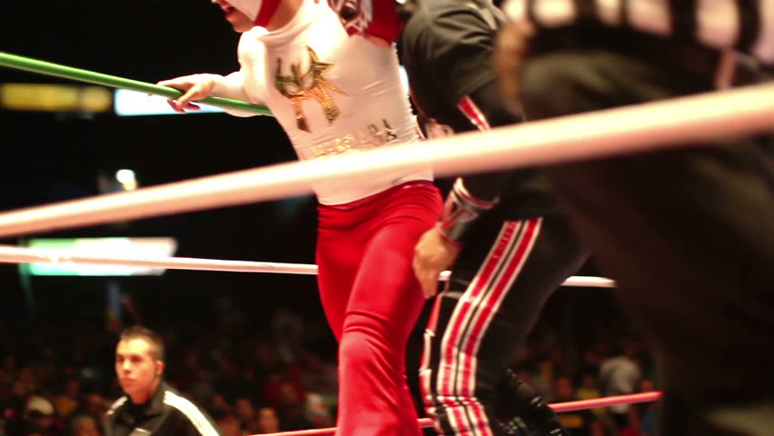 MEXICO CITY - DECEMBER 19: Ringside view of a lucha libre, famous mexican wrestling competition at Arena Mexico on DECEMBER 19, 2011 in Mexico City, Mexico. 