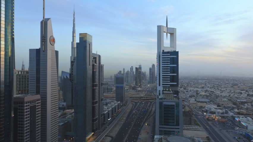 DUBAI, UNITED ARAB EMIRATES - MARCH 14: Time lapse, dusk to night transition of Dubai cityscape on Sheikh Zayed Road, the busiest road in the city on March 14, 2011 in Dubai, United Arab Emirates.