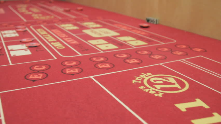 panning view of bets placed on a crap table
