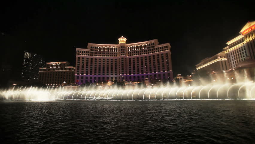 LAS VEGAS - CIRCA 2010: Water fountains dancing at night in front of the Bellagio circa 2010 in Las Vegas, Nevada.