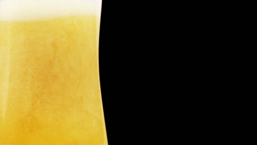 Fresh beer with froth and condensed beer  drops. Alpha matte