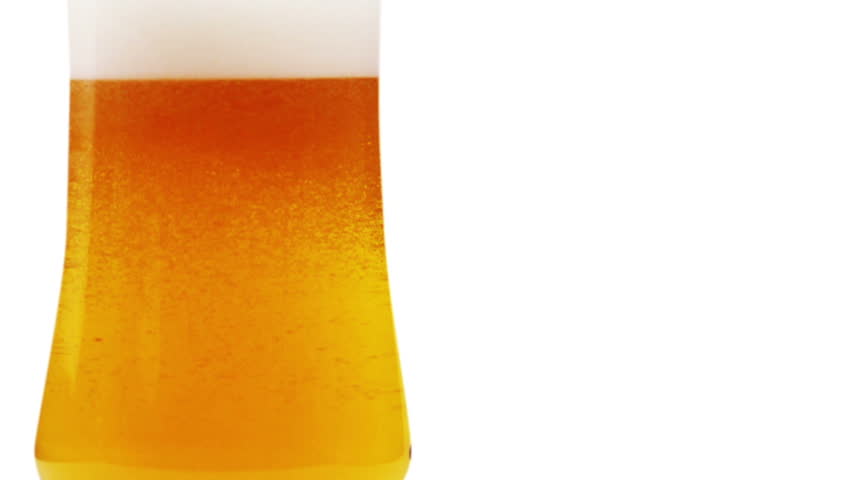 Fresh beer with froth and condensed beer  drops. Alpha matte