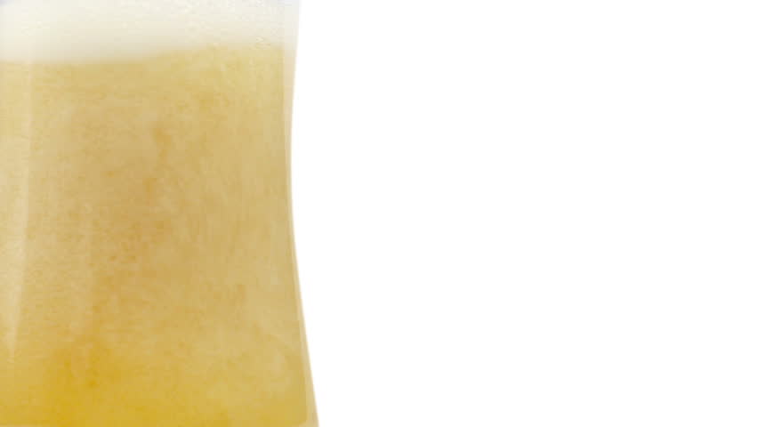 Fresh beer with froth and condensed beer  drops. Alpha matte