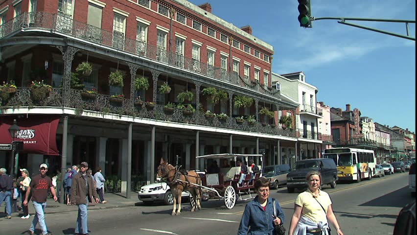 NEW ORLEANS, LA - CIRCA 2005: New Orleans French quarter scene as carriage passes by