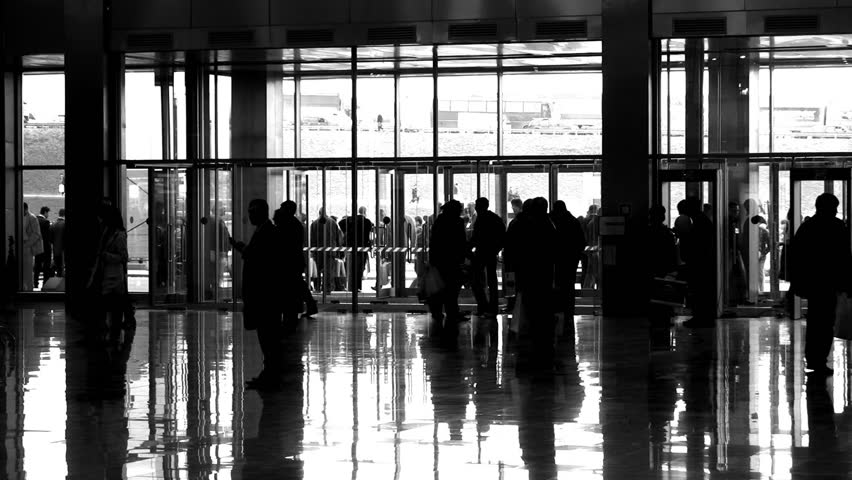 silhouette people in enter hall 