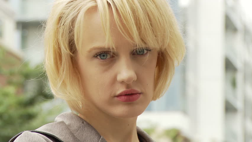 View of a serious businesswoman looking into the camera in USA