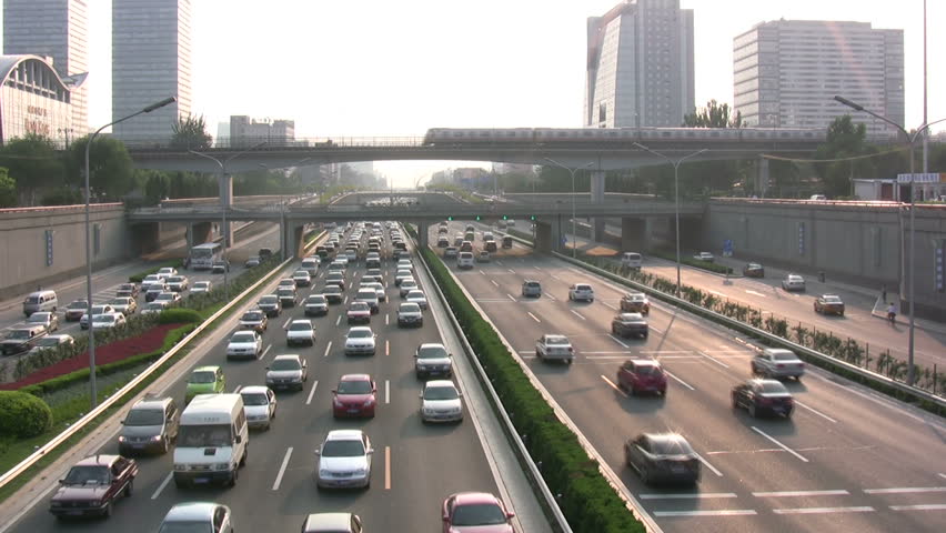 Traffic drives over the modern highways of Beijing, China