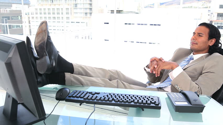 Hy Businessman The Feet On His Desk In A Office With City Hy Businessman The Feet On His Desk In A Office With City View Hd